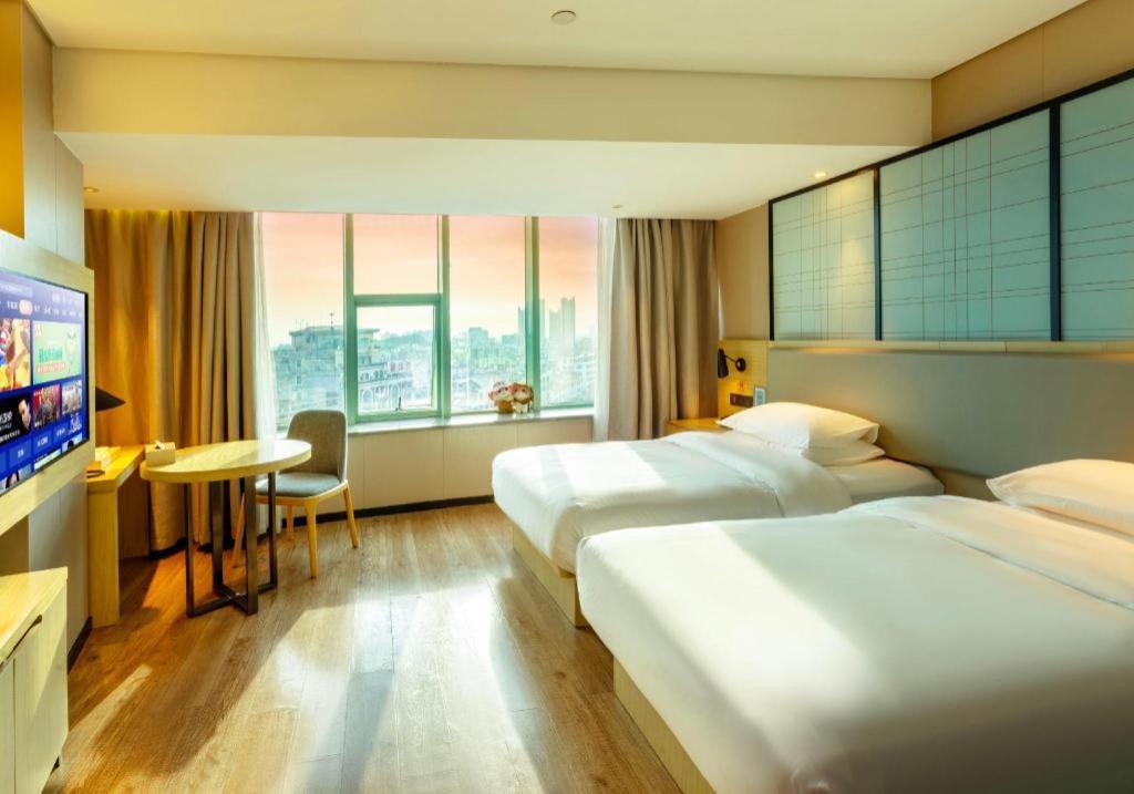 Echarm Hotel Yangjiang Baili Plaza Esterno foto
