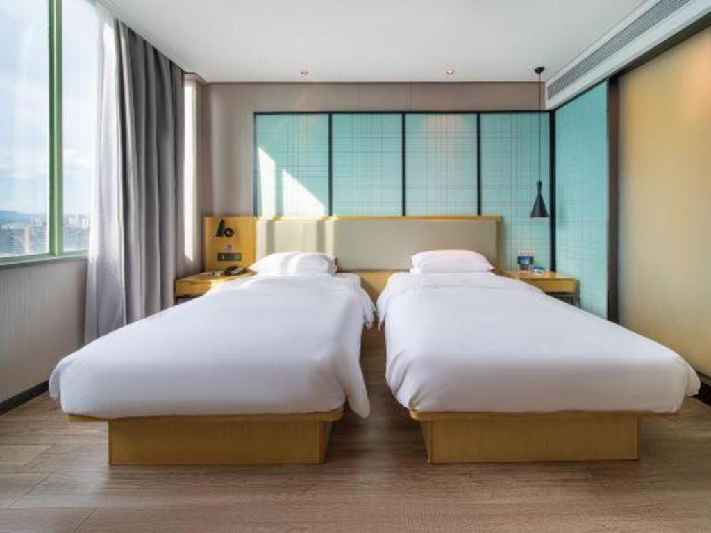 Echarm Hotel Yangjiang Baili Plaza Esterno foto