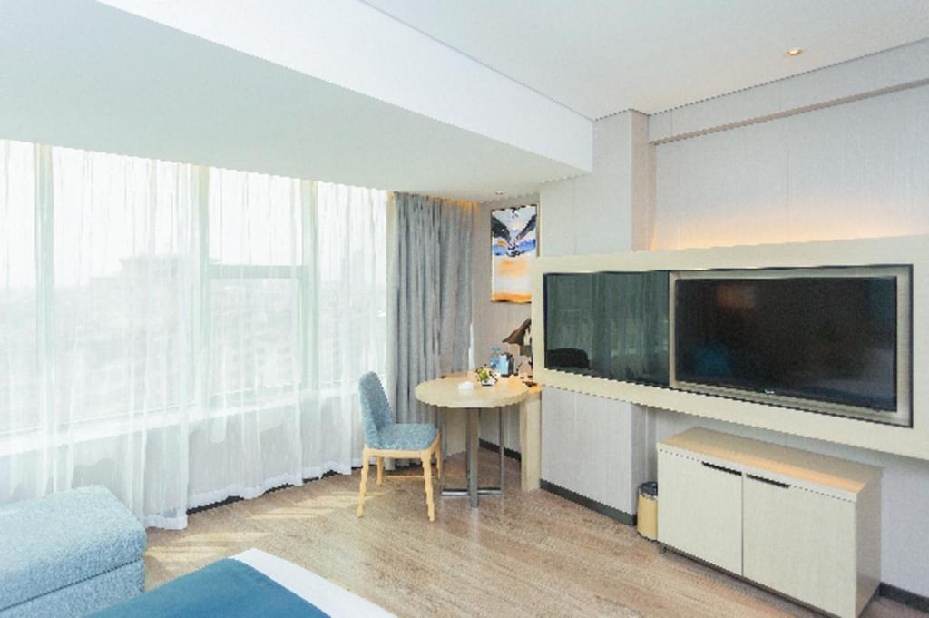 Echarm Hotel Yangjiang Baili Plaza Esterno foto
