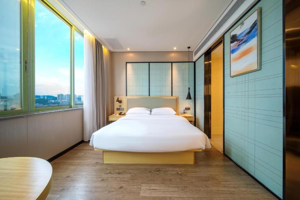 Echarm Hotel Yangjiang Baili Plaza Esterno foto