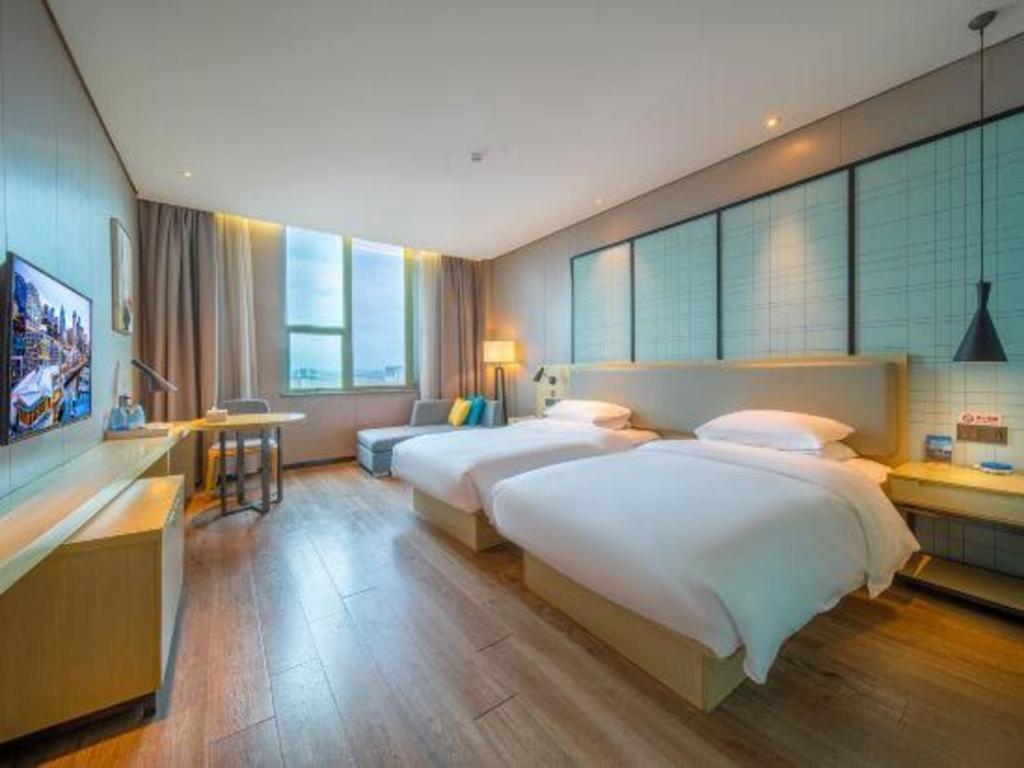 Echarm Hotel Yangjiang Baili Plaza Esterno foto