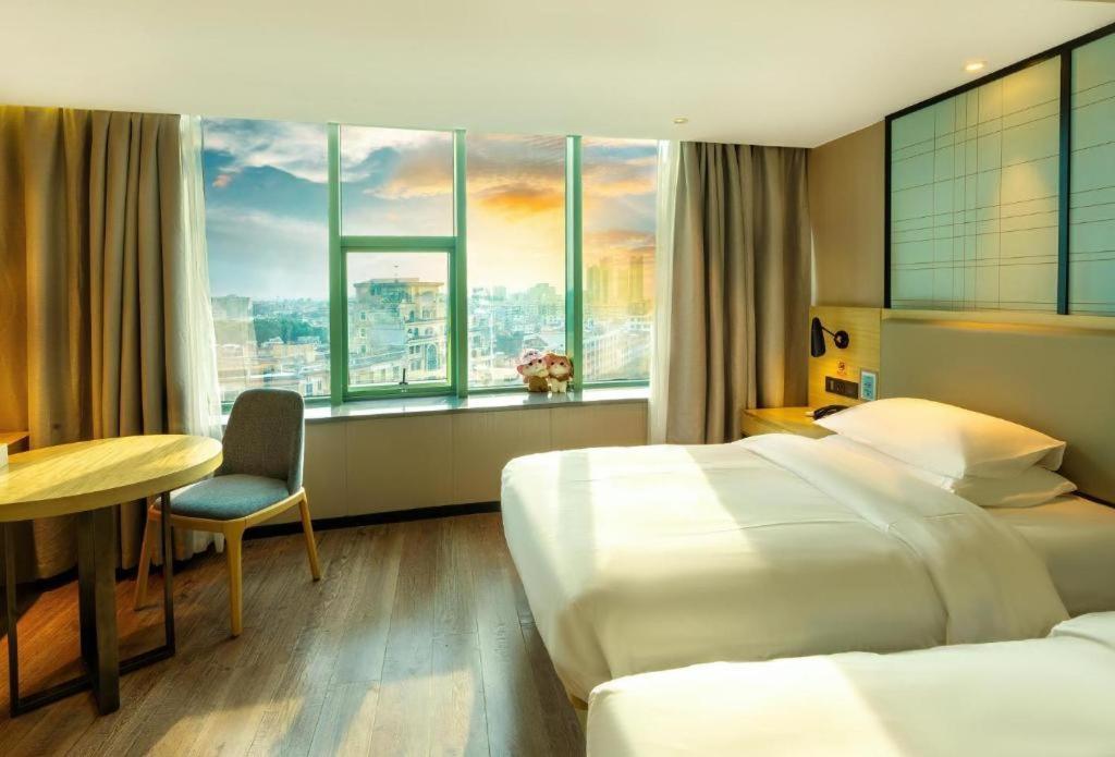 Echarm Hotel Yangjiang Baili Plaza Esterno foto