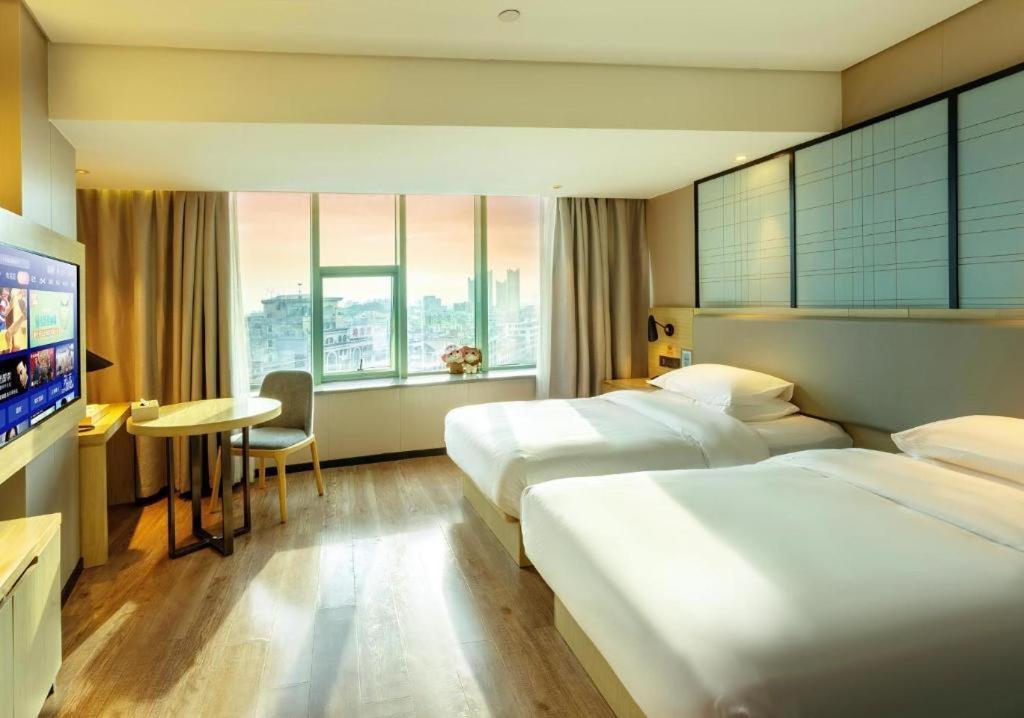 Echarm Hotel Yangjiang Baili Plaza Esterno foto